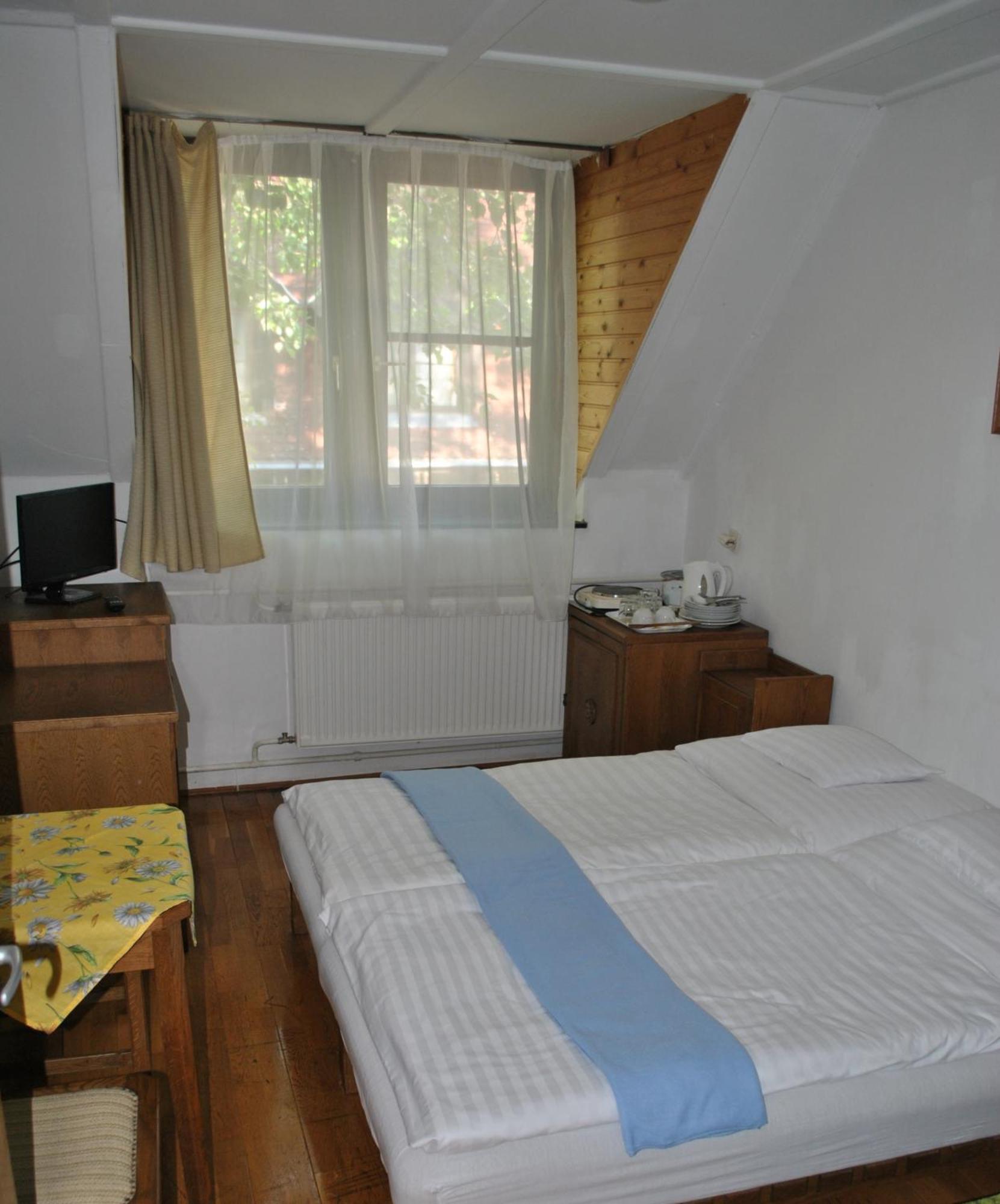Harmonia Apartmanhaz بالاتوليلّي الغرفة الصورة